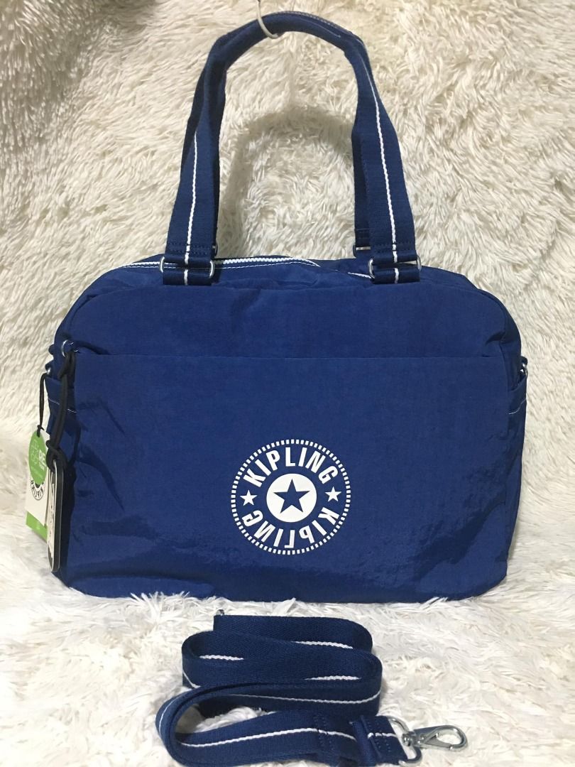 SALE!! Authentic! KIPLING Weekender Bag (Category: Tote Bags) located in Baguio. Submitted by u.shop.php (Listing ID 1287540276, Image 1). Description: Authentic! KIPLING Weekender Versatile Lightweight Overnight Tote Nylon Dual carry handles Adjustable, removable crossbody strap Front zip pocket 2 side pockets Internal zip pocket Monkey keychain Brand New Original price ₱7,790 Selling only at a LOW LOW price!.
