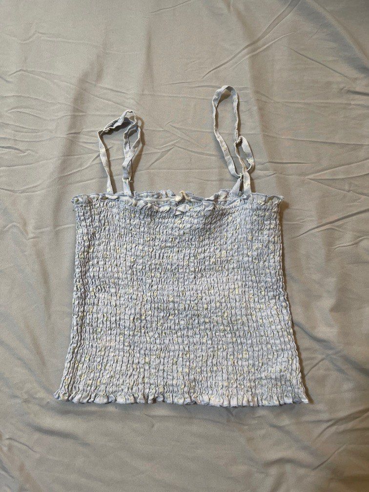 Baby blue smoked sleeveless top (Category: Sleeveless) located in Quezon City. Submitted by lovedbysnow (Listing ID 1287418655, Image 1). Description: Can fit S-semi M since its smoked.