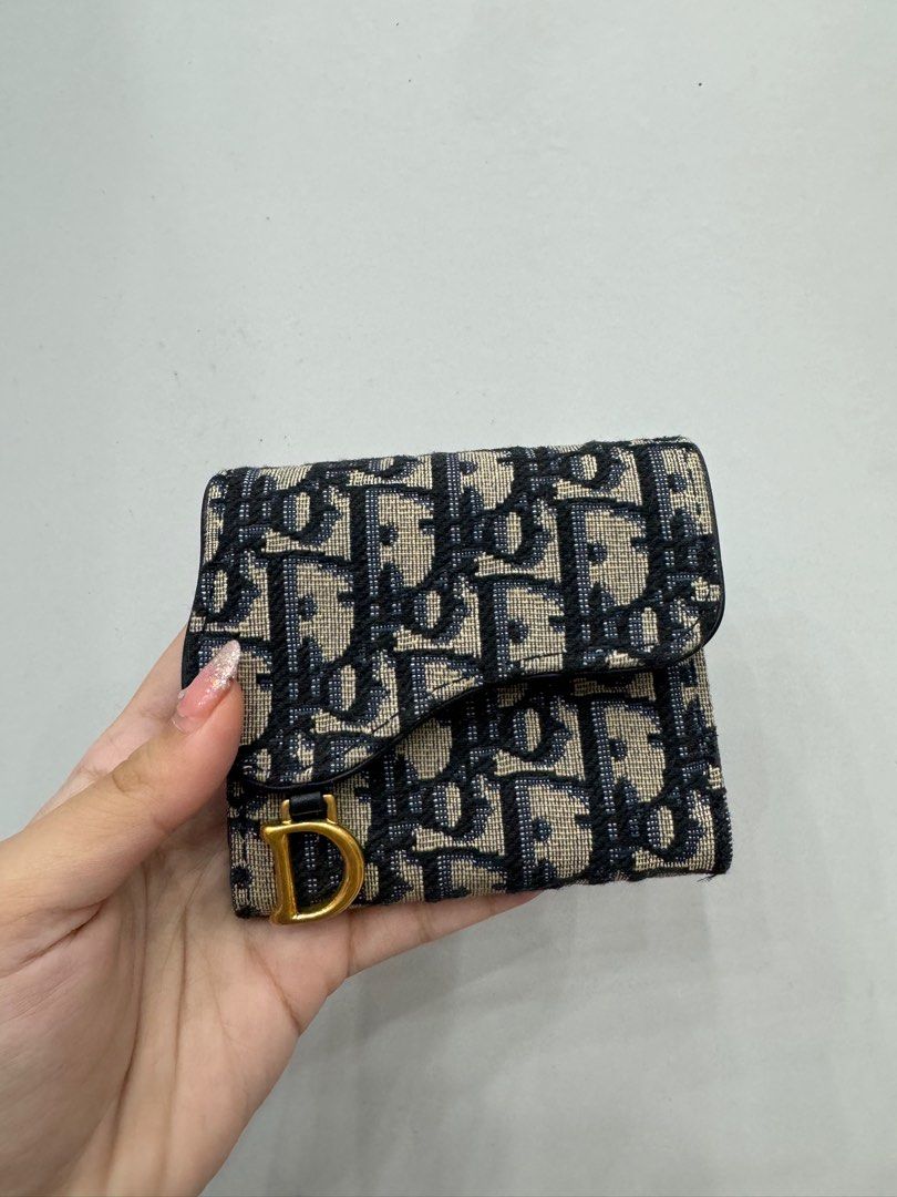 ❌RESERVED❌ Guaranteed authentic Dior Oblique Saddle Lotus wallet (Category: Luxury Bags & Wallets) located in Naga. Submitted by akimadison.ph (Listing ID 1287646203, Image 2). Description: Guaranteed authentic dior saddle lotus wallet Super steal!! Unused. Perf for gifting! 💖 Oblique With free conversion kit to make it into a woc.