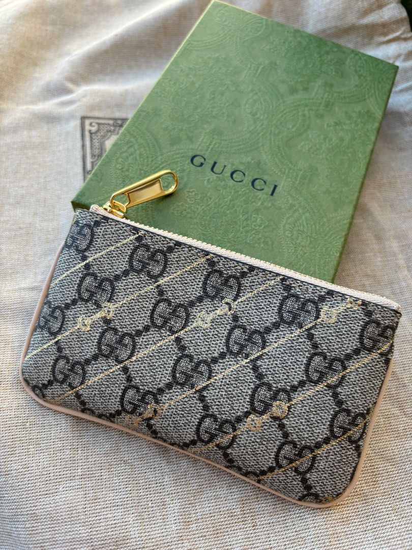 Gucci supreme outlet key pouch