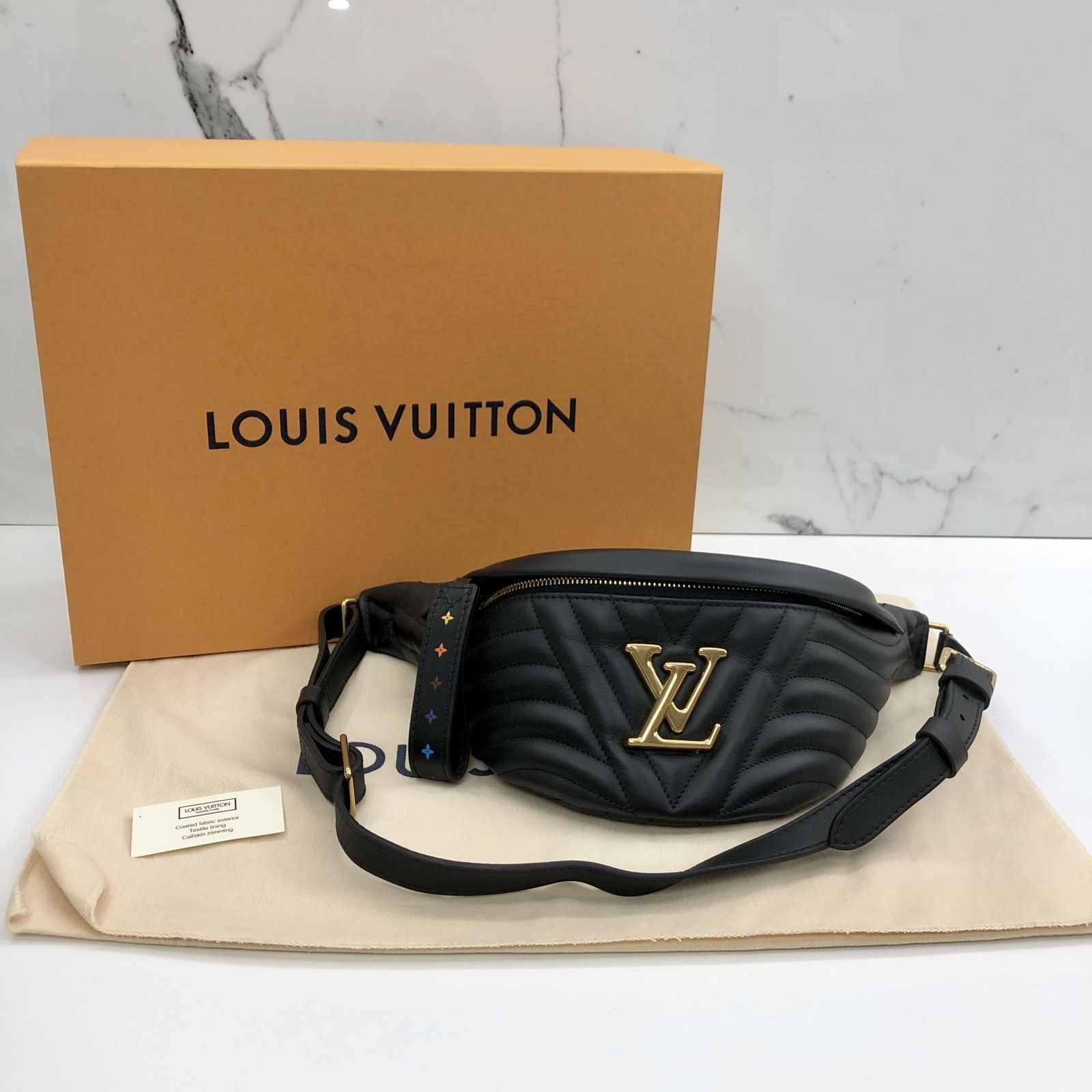 DISCOUNTED LOUIS VUITTON M53750 BLACK LEATHER NEW WAVE BUM WAISTBAG 247002962 WE Luxury Bags Wallets on Carousell