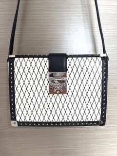 Corina crossbody clutch in visetos block leather online