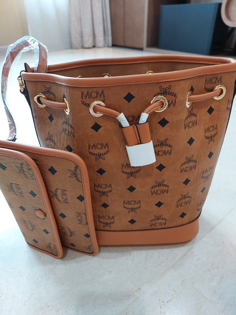 Mcm bucket bag price on sale
