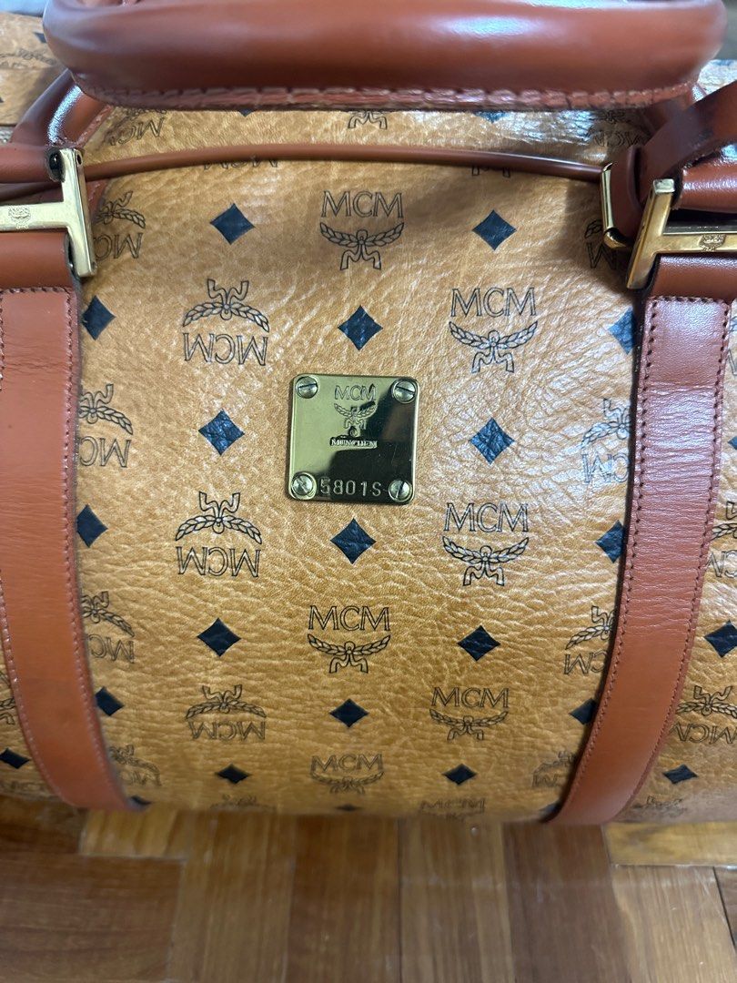 Mcm carry best sale on bag