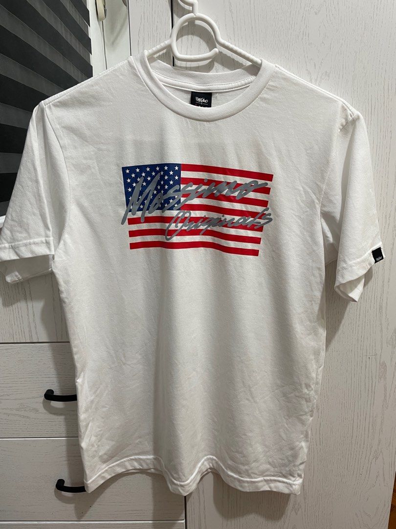 Mossimo 100% Cotton White Shirt for Men (Category: Tshirts & Polo Shirts ) located in Pasig City. Submitted by redmuse7 (Listing ID 1287548377, Image 1). Description: Bought in Los Angeles. Never used. 100% cotton and thicn fabric. No issues. Dimensions: Length from neckline to bottom 24.5 inches Width armpit to armpit 20 inches.