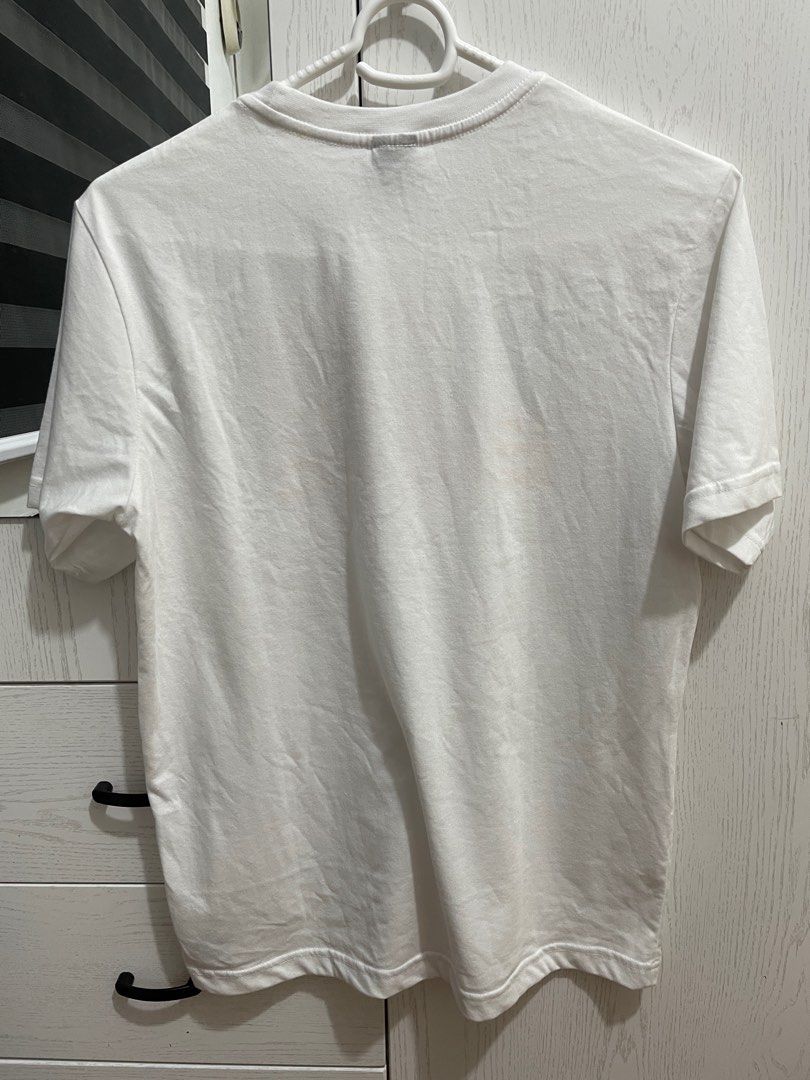 Mossimo 100% Cotton White Shirt for Men (Category: Tshirts & Polo Shirts ) located in Pasig City. Submitted by redmuse7 (Listing ID 1287548377, Image 2). Description: Bought in Los Angeles. Never used. 100% cotton and thicn fabric. No issues. Dimensions: Length from neckline to bottom 24.5 inches Width armpit to armpit 20 inches.