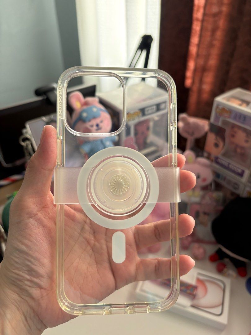 Popsockets Magsafe Clear Case (iPhone 14 PM) (Category: Cases & Sleeves) located in Caloocan City. Submitted by kangulo (Listing ID 1287353234, Image 2). Description: Popsockets Magsafe Clear Case for iPhone 14 Pro Max actual pics posted authentic x sensi since this is pre-loved item but well-loved P2,000 Payment Options: Maya BPI Shipment: SDD (Lalamove/Grab) GGX.