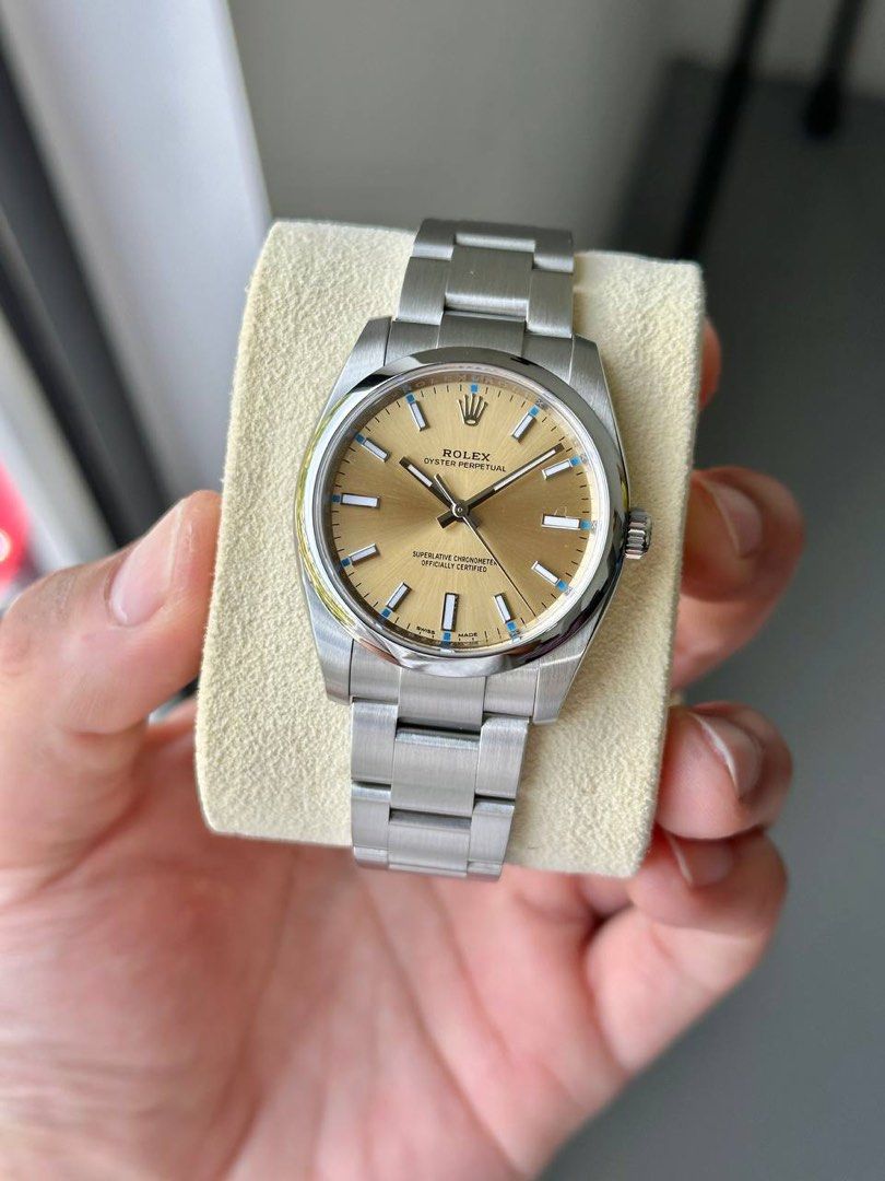 Rolex oyster perpetual hotsell 34 champagne dial