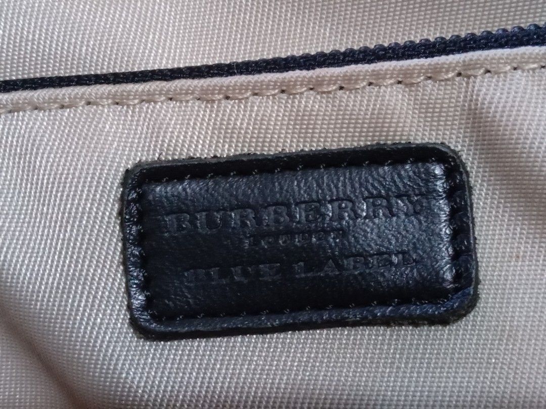 BURBERRY Messenger bag (Category: Sling Bags) located in Manila. Submitted by monchiing (Listing ID 1287834469, Image 2). Description: Burberry blue label messenger bag 9/10 bag condition.