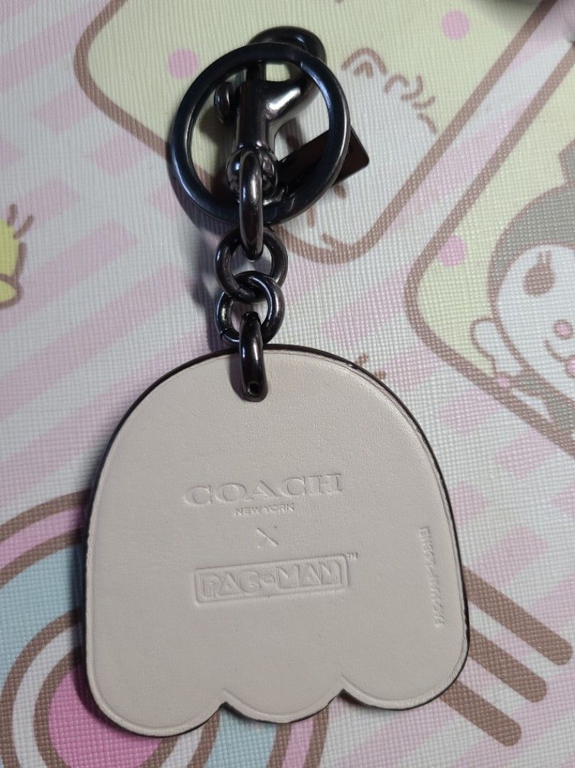Coach pac hotsell man keychain