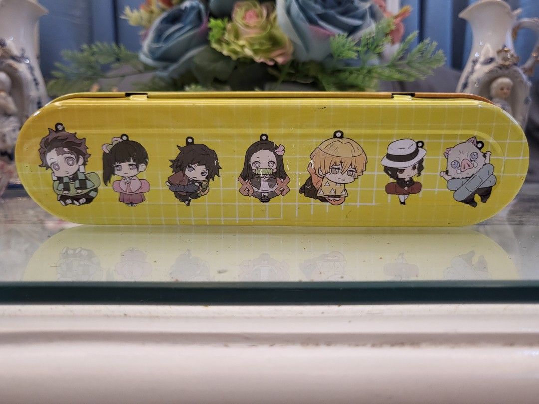 Demon Slayer 2-Layer Yellow Metal Pencil Case (Category: Stationery & School Supplies) located in San Fernando. Submitted by jpmarketplace2023 (Listing ID 1287849513, Image 2). Description: -Demon Slayer 2-layer yellow metal pencil case for only PHP200 -Authentic from Japan.