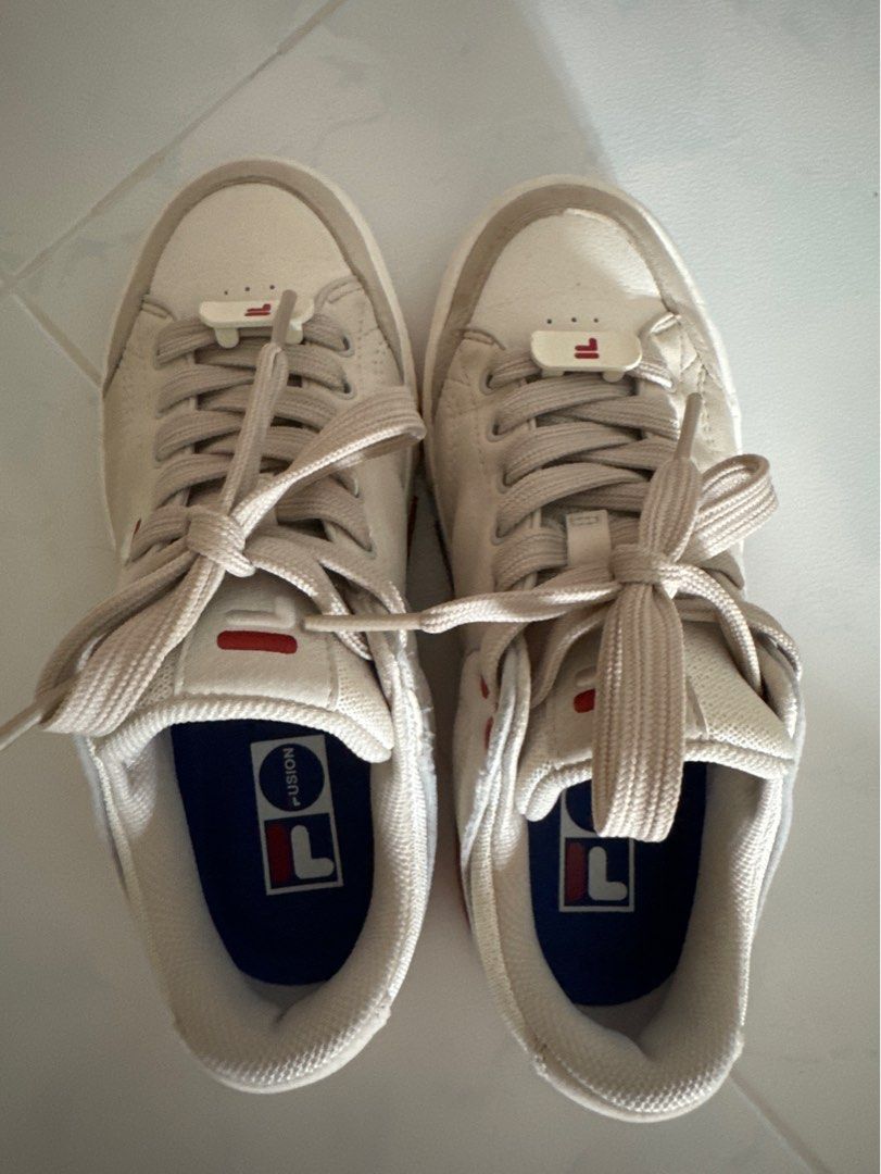 Red and store white fila sneakers