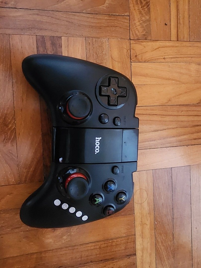 Hoco Bluetooth controller (Category: Controllers) located in Singapore. Submitted by sarans94 (Listing ID 1287709324, Image 2). Description: Bluetooth controller. bought wrongly can't support my mobile.