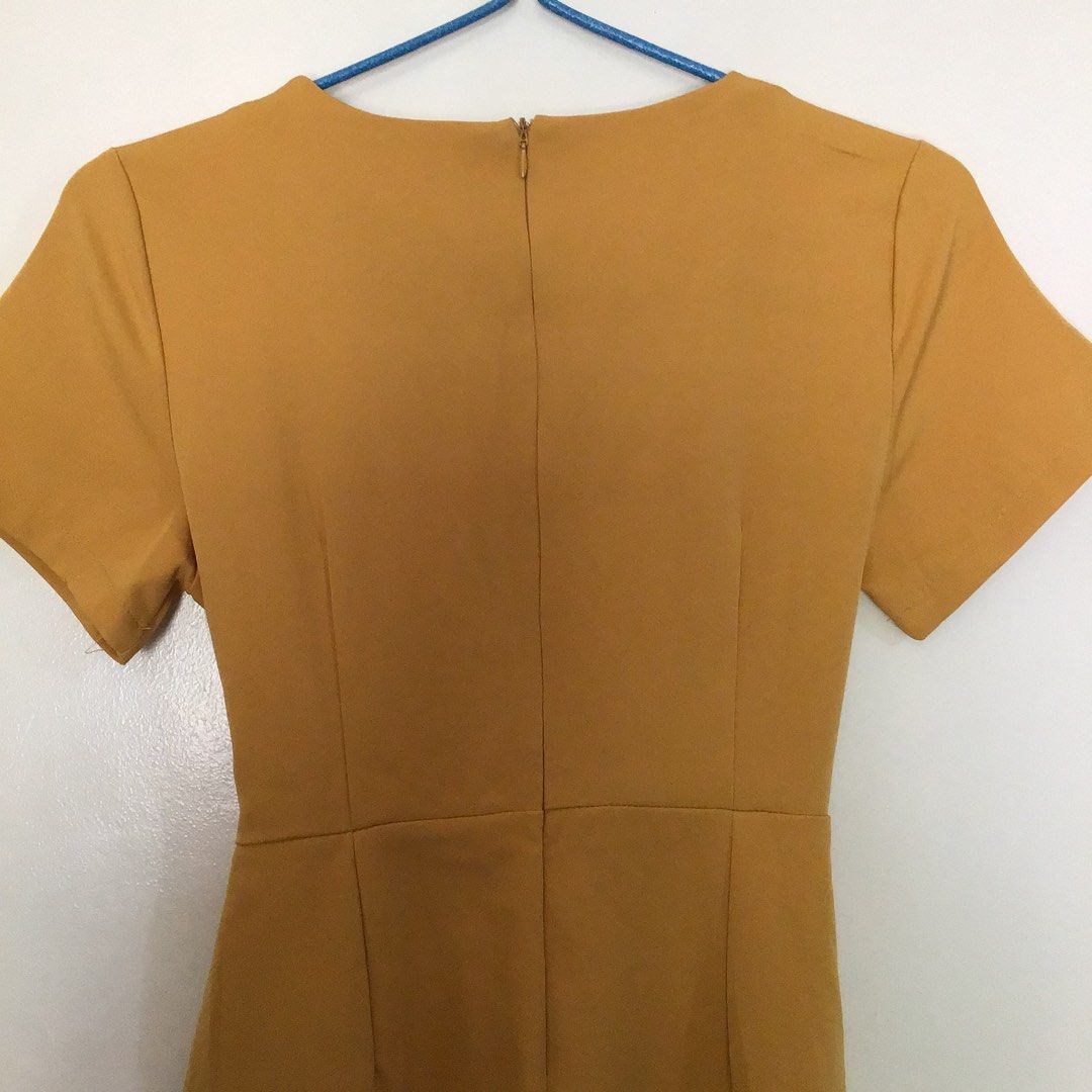 Mustard Jumpsuit (Category: Jumpsuits) located in San Carlos. Submitted by cometsans (Listing ID 1287713309, Image 3). Description: LP ( Please no haggling) - Please read the description before inquiry WOMEN'S MUSTARD JUMPSUIT - Never been used, still with tag (na-stock lang sa cabinet) - Color condition: 10/10 - Made from thick material, good for formal/semi-formal events - See last photo for measurements - has some very minimal dirt (I'm not su