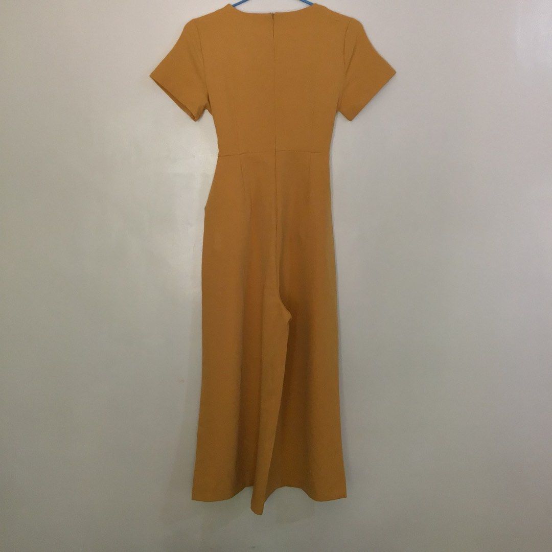 Mustard Jumpsuit (Category: Jumpsuits) located in San Carlos. Submitted by cometsans (Listing ID 1287713309, Image 2). Description: LP ( Please no haggling) - Please read the description before inquiry WOMEN'S MUSTARD JUMPSUIT - Never been used, still with tag (na-stock lang sa cabinet) - Color condition: 10/10 - Made from thick material, good for formal/semi-formal events - See last photo for measurements - has some very minimal dirt (I'm not su