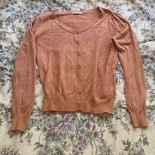 Peach eyelet knitted top