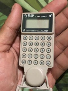 Pocket calculator digital alarm clock key charm