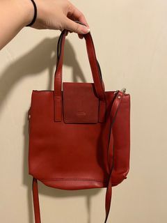 red roots leather bag