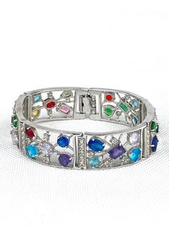 Silver bracelet with decorative gemstones