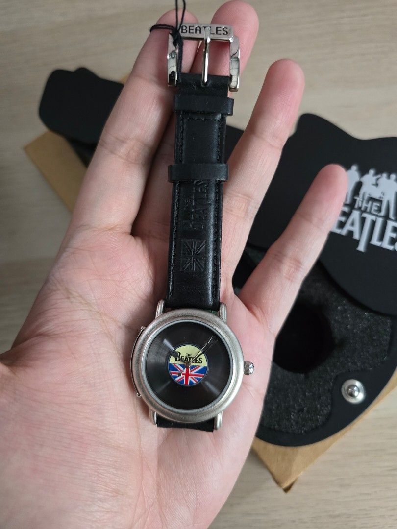 Beatles watch in deals guitar case