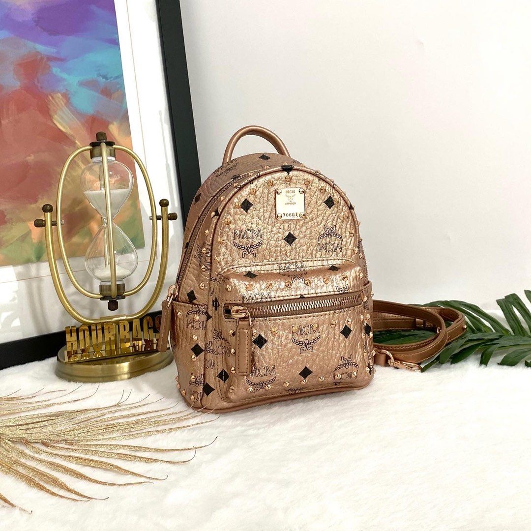 Mcm rose shop gold purse