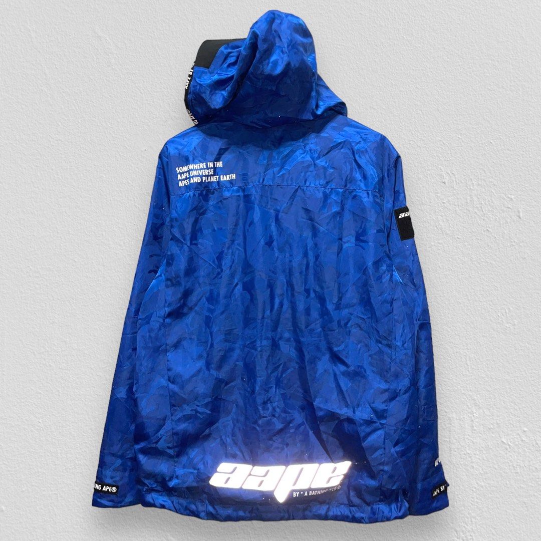 Aape Rain Jacket (Category: Coats, Jackets and Outerwear) located in Makati City. Submitted by unclesource (Listing ID 1288067078, Image 2). Description: Crack print at the bottom part at the back. Great condition overall! 31” x 23.5”.