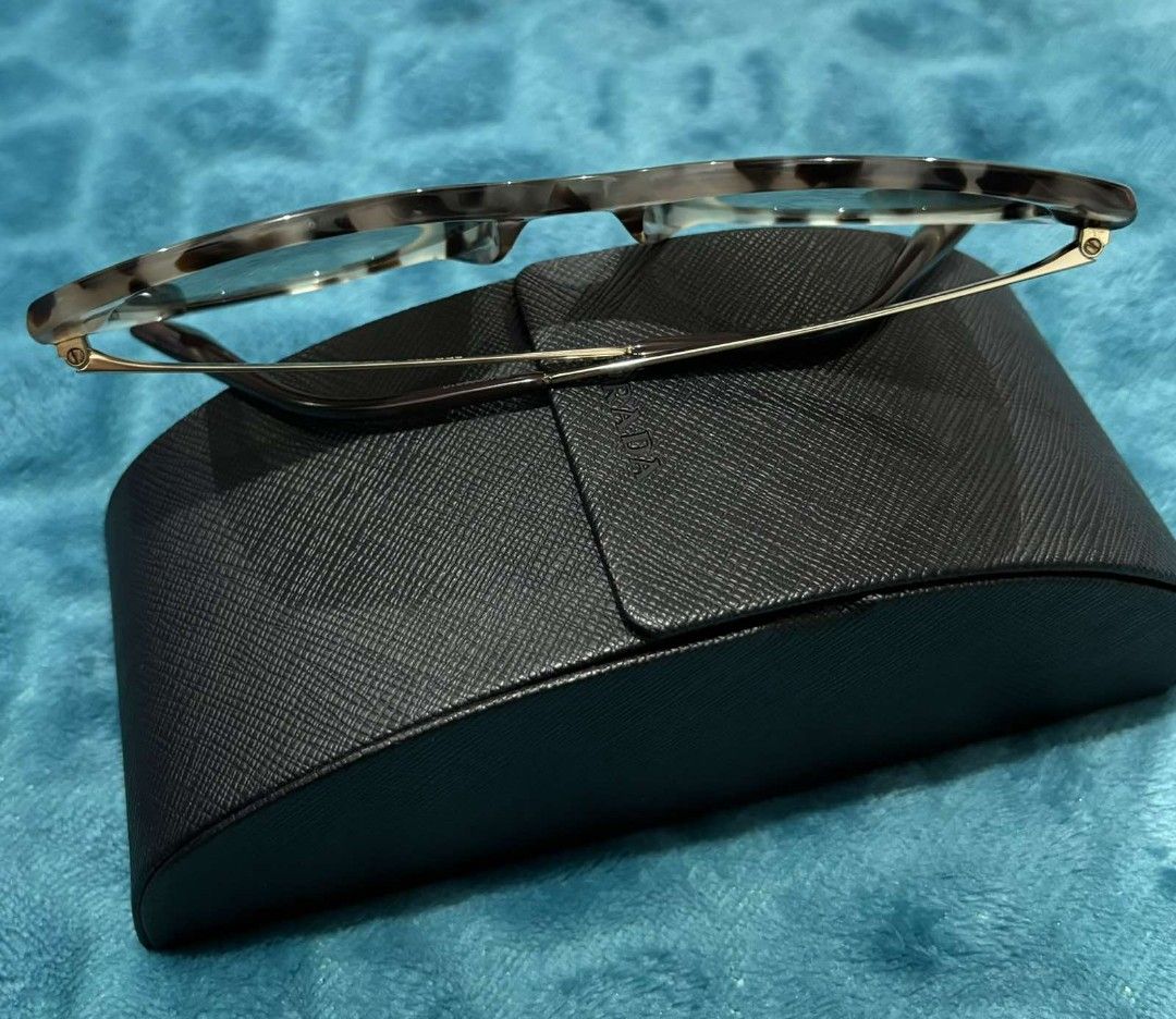 Auth Prada shades in mint condition (Category: Sunglasses & Eyewear) located in Paranaque City. Submitted by egg_shells (Listing ID 1288022405, Image 3). Description: Bought this in Prada Tokyo last year for almost 16k and was worn only few times Authentic Prada tortoise shell cat eye sunglasses in mint condition, Rank 9.5/10 Includes hard case..missing cloth. rfs: unfortunately I have to use progressive Eyewear due to age so wearing shades is ha