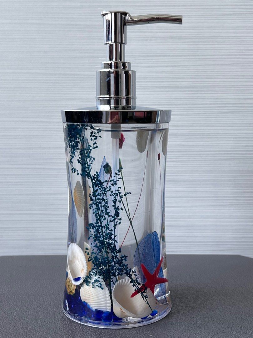 Bathroom Set (Category: Other Home Decor) located in Singapore. Submitted by miumiutay (Listing ID 1287940974, Image 3). Description: Seashells, flowers, leaves in between wall of containers filled with water, moves along when container is moved..