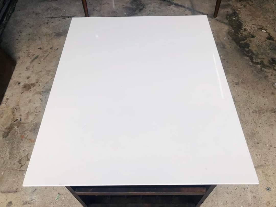 Expendable table (Category: Tables & Sets) located in Quezon City. Submitted by matetdevis13 (Listing ID 1287913030, Image 3). Description: White extendable table Price 4200 29 1/2 / 36L x 29 1/2W x 27 1/2H inches With side magazine rack In good condition Code akc 906.