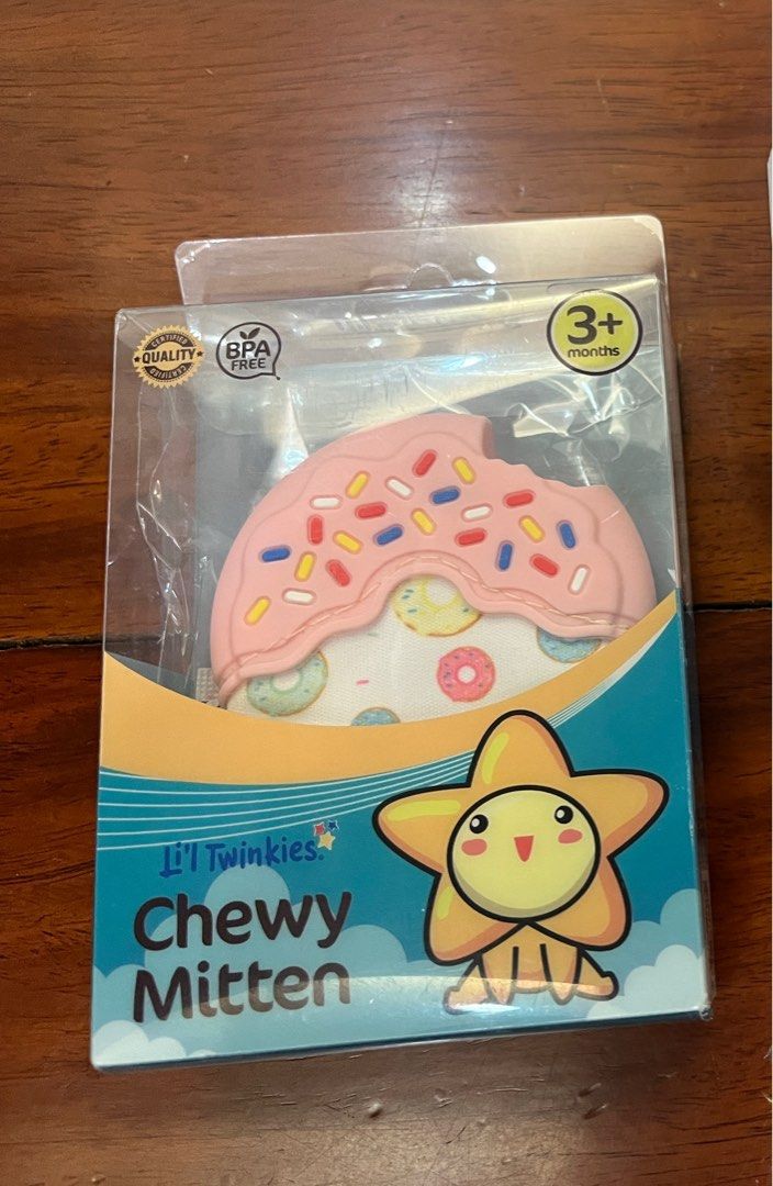 lil Twinkies Chewy Mitten (Category: Soothers & Pacifiers) located in Quezon City. Submitted by muffet9 (Listing ID 1288052247, Image 1). Description: Li’l Twinkies Chewy Mitten is made with 100% food-grade, safe materials that will serve as a soother for teething babies to help relieve sore, itchy gums. Also serves as a learning toy that features multiple sensory textures, crinkle sound, fun colors and shapes to promote baby’s sensory stimulatio