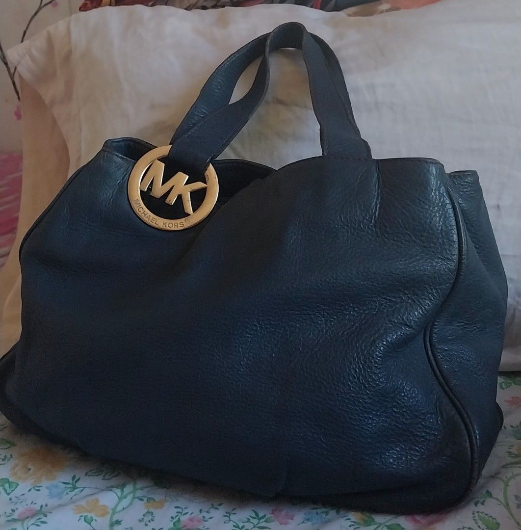 Original MK (Category: Shoulder Bags) located in Manila. Submitted by digs1968 (Listing ID 1281231108, Image 1). Description: Original leather Mk selling low rfs: decluttering flaw: refer to the last photo.