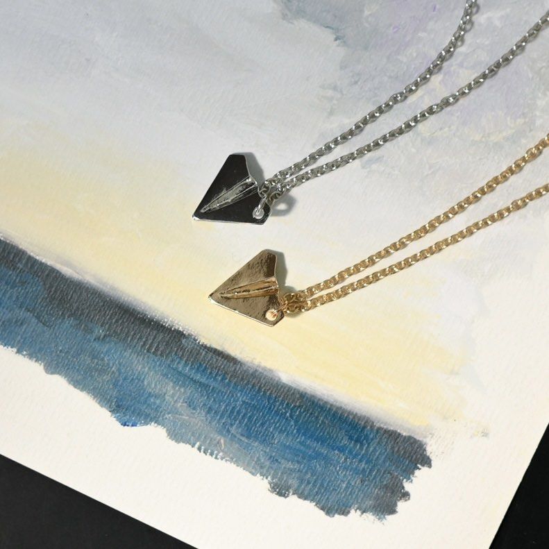 Paper Airplane Necklace- Inspired by Harry Styles from One Direction/Taylor  Swift | Paper airplane necklace, Airplane necklace, Plane necklace