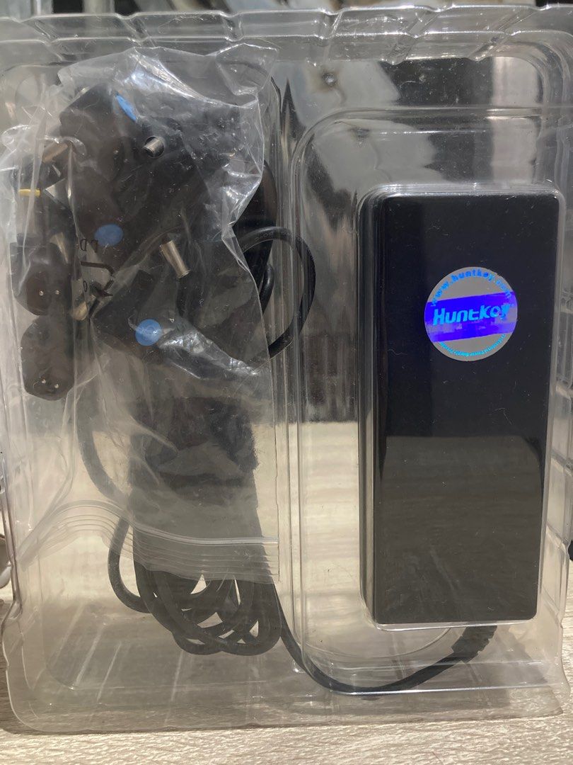 90W Universal Laptop Charger (Category: Chargers) located in Manila. Submitted by galingand42566 (Listing ID 1283684224, Image 3). Description: Selling Huntkey Universal Laptop/Notebook Adapter 90W (Like Brandnew) No scratches or dents. Price: 1000 RFS: Nakatago lang, for back-up lang po sana.Need money. Loc: Padilla, Antipolo City MOP:COD via Lalamove GCASH.