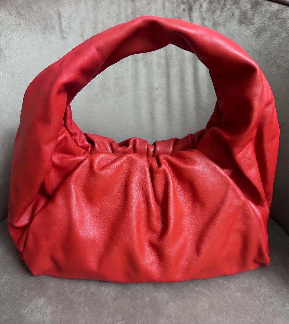 Authentic Bottega Veneta Pouch Shoulder Bag (Category: Luxury Bags & Wallets) located in Rizal. Submitted by SummerPeaCloset (Listing ID 1283894242, Image 1). Description: Authentic Bottega Veneta Pouch Shoulder Bag With provided dustbag In great condition Layaway ready (T&Cs apply) Selling low for Php 82000 Preloved price usually ranges between 90k - 120k All our items are money back guaranteed authentic #2024declutter.