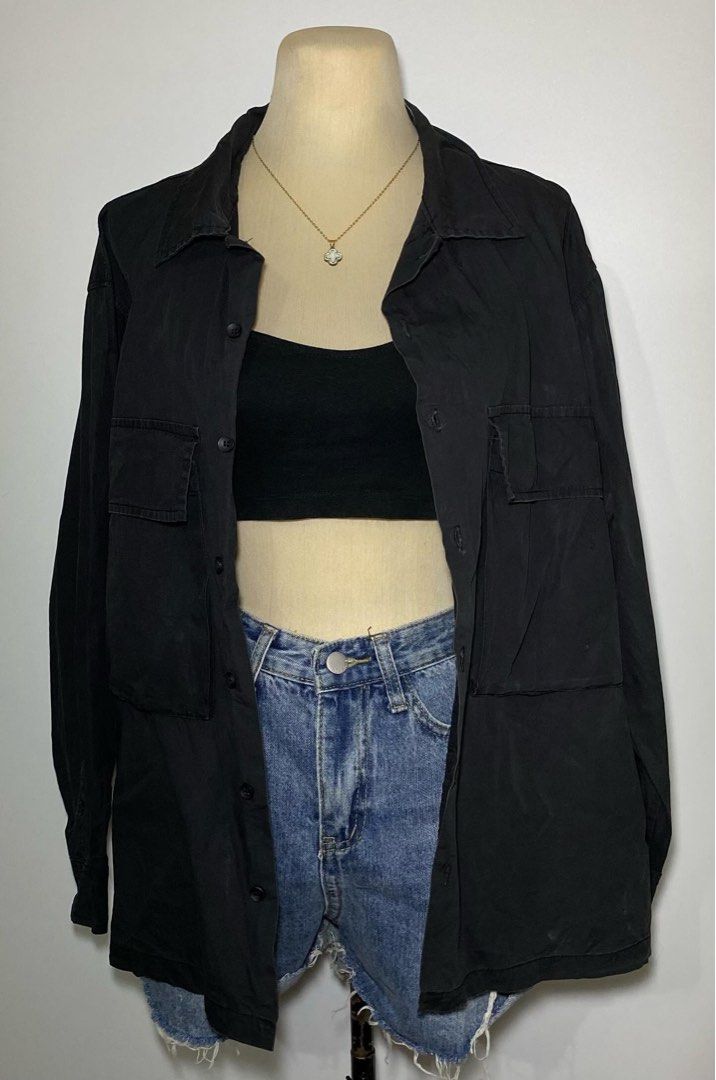 black buttondown long sleeve polo (Category: Longsleeves) located in Bacoor. Submitted by jellynred (Listing ID 1283891141, Image 1). Description: fits s-l (slightly oversized fit on s/m) • pocket design at the front • kind of like a windbreaker fabric • lightweight • needs wash & ironing • in great condi!.