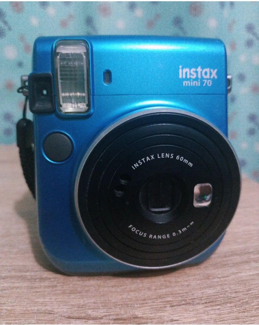 Instax Mini 70 (Category: Cameras) located in Angeles City. Submitted by cleanshop.ph (Listing ID 1283691754, Image 1). Description: Instax Mini 70 Blue Personally owned instax No issues RFS: Decluttering.