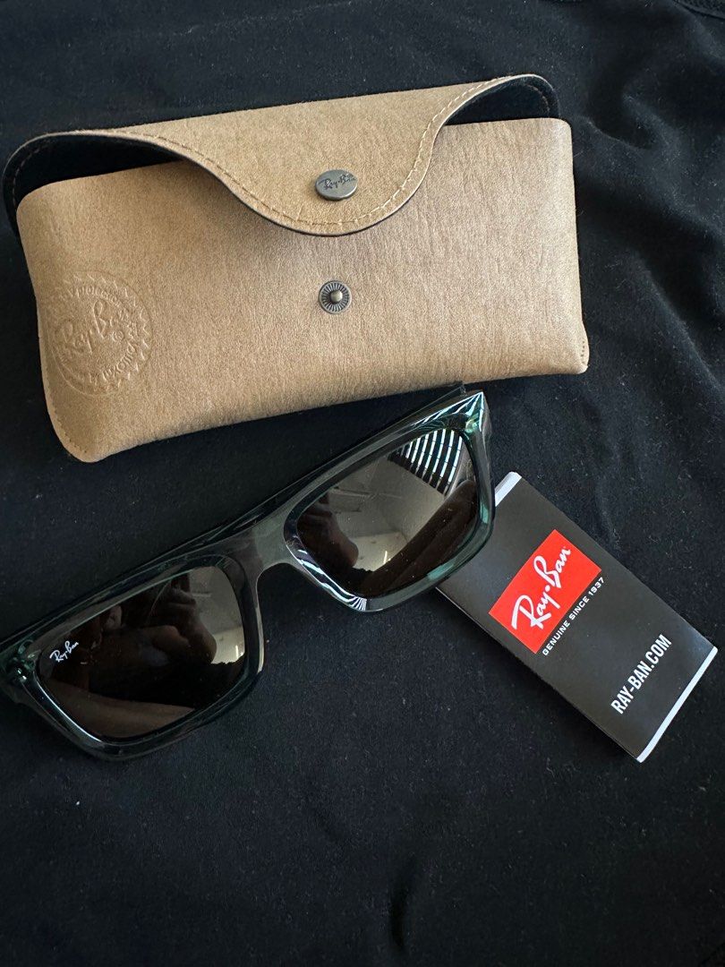 RAY-BAN men’s warren rectangular glasses (Category: Sunglasses & Eyewear) located in Santa Rosa. Submitted by shoppiaholic (Listing ID 1283698475, Image 1). Description: “Effortlessly cool, RB4396 Warren is a modern spin on the classic squared silhouette. It features 3D details to the thick unisex frame, crafted from bio-based acetate for an eco-conscious generation.”.
