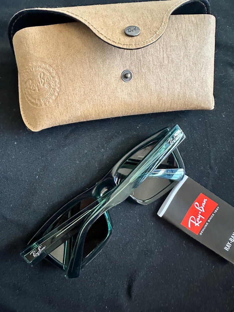 RAY-BAN men’s warren rectangular glasses (Category: Sunglasses & Eyewear) located in Santa Rosa. Submitted by shoppiaholic (Listing ID 1283698475, Image 2). Description: “Effortlessly cool, RB4396 Warren is a modern spin on the classic squared silhouette. It features 3D details to the thick unisex frame, crafted from bio-based acetate for an eco-conscious generation.”.