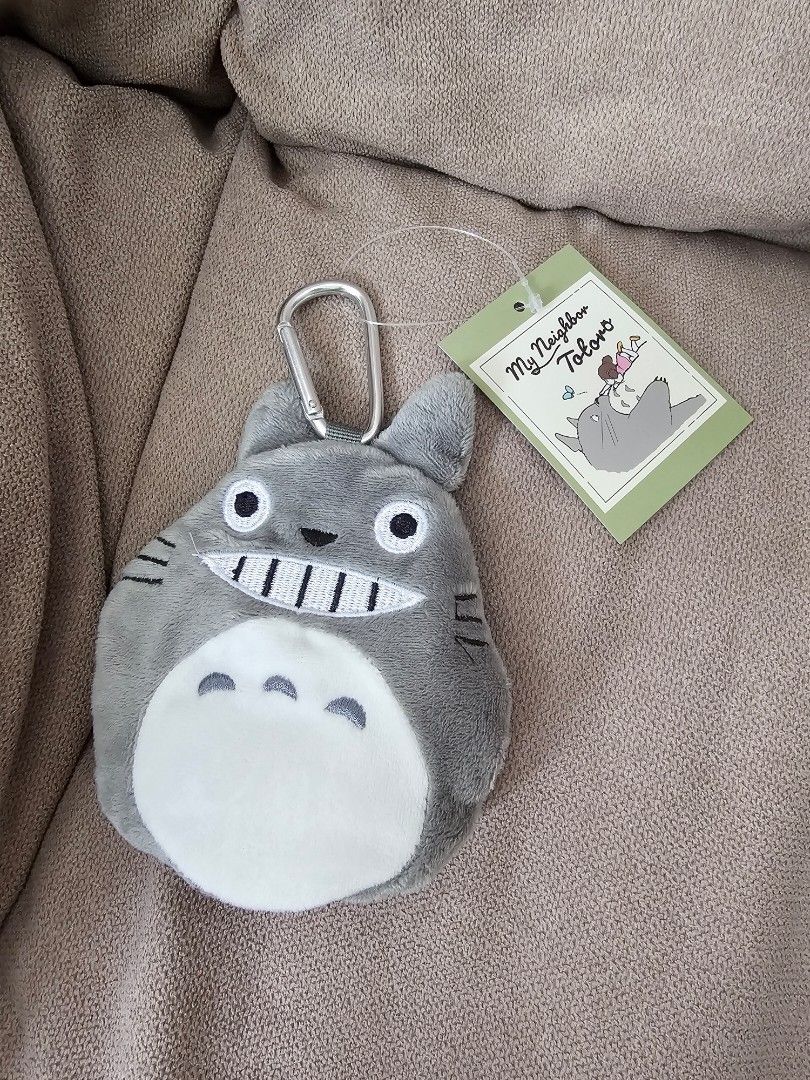 (Ready Stock from Japan 🇯🇵 ) Studio Ghibli Totoro - Grinning Grey Totoro Plush with Zip, Eco Tote Bag Contained within the Plush Toy Keychain (Category: Babies & Kids Fashion) located in Singapore. Submitted by oddball.fishes (Listing ID 1283694483, Image 2). Description: Ready Stock from Japan 🇯🇵 Studio Ghibli Totoro - Grinning Grey Totoro Plush with Zip, Tote Bag Contained within the Plush Toy Keychain Max. Load: 10kg.
