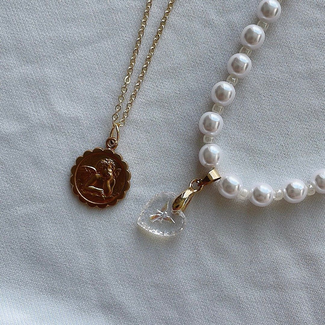 Raphael outlet angel pendant