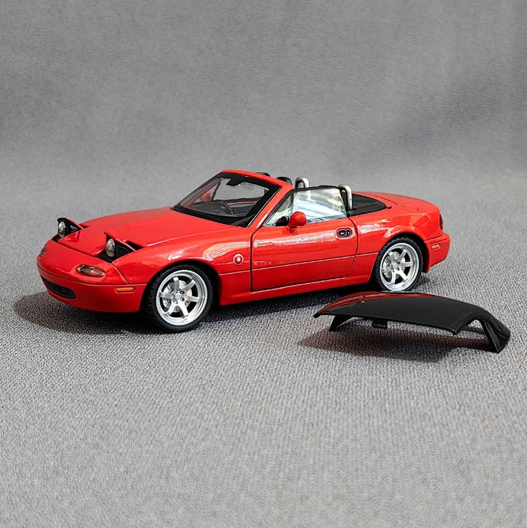 1/32 Mazda MX-5 Miata NA Diecast Scale Model (Category: Vehicle & Diecast Models) located in Antipolo. Submitted by blueandyellow (Listing ID 1288246186, Image 1). Description: Red Miata New Color Variant! 1/32 Mazda MX-5 Miata NA Diecast Scale Model Diecast Metal Body, Rubber Tires and Plastic Accessories 1/32 scale ~ Approximately 6 inches in length Opening Doors, Hood and Trunklid Working Head Lights and Tail Lights Poseable Front Wheels Worki