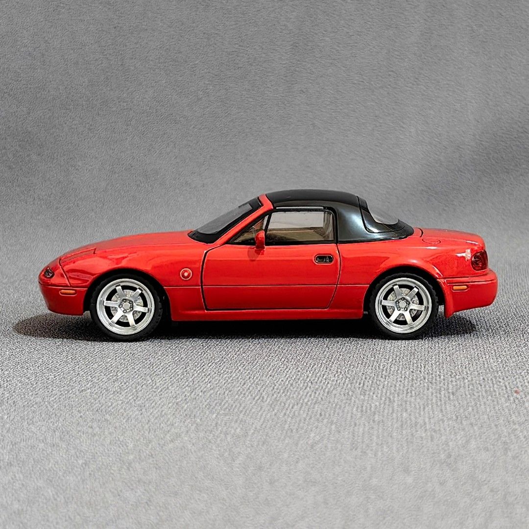 1/32 Mazda MX-5 Miata NA Diecast Scale Model (Category: Vehicle & Diecast Models) located in Antipolo. Submitted by blueandyellow (Listing ID 1288246186, Image 3). Description: Red Miata New Color Variant! 1/32 Mazda MX-5 Miata NA Diecast Scale Model Diecast Metal Body, Rubber Tires and Plastic Accessories 1/32 scale ~ Approximately 6 inches in length Opening Doors, Hood and Trunklid Working Head Lights and Tail Lights Poseable Front Wheels Worki