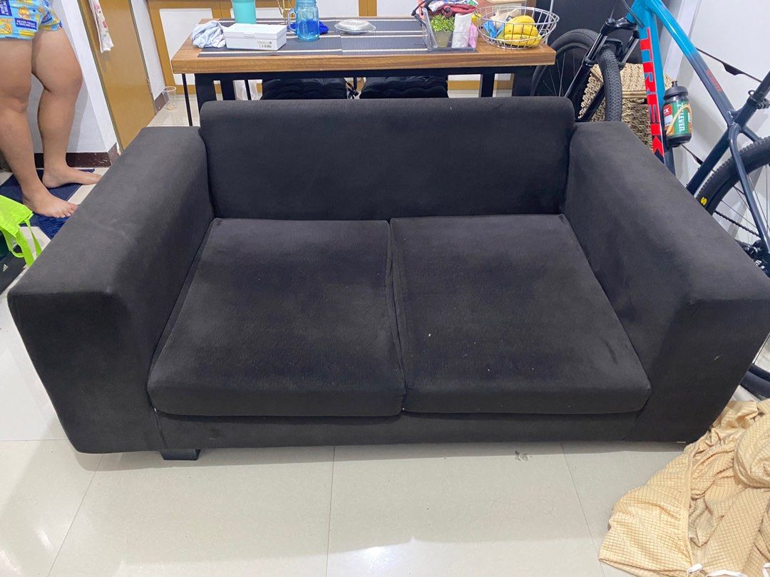 2 seater black couch with free sofa cover (Category: Sofas) located in Rizal. Submitted by julsdeclutterss (Listing ID 1288347959, Image 1). Description: Bought it for 18k Comfy and cozy Super black, naka cover since nabili. Sa lightning ata kaya may white white Issue: need reinforcement sa right front na paa nung sofa then parang lundo ng very light may nabali na wood but still a decent sofa that serves its purpose Rfs : moving out.