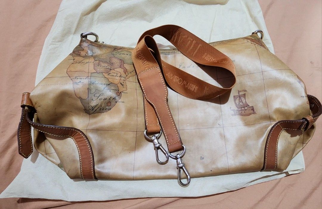Alviero Martini shoulder bag (Category: Luxury Bags & Wallets) located in Cebu City. Submitted by rhea20ph (Listing ID 1288416983, Image 3). Description: pre loved item medium to semi large size glossy leather material guitar strap normal signs of wear plus sf.
