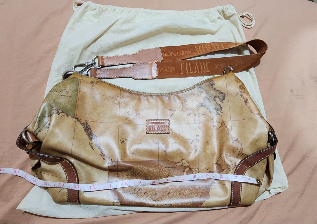 Alviero Martini shoulder bag (Category: Luxury Bags & Wallets) located in Cebu City. Submitted by rhea20ph (Listing ID 1288416983, Image 1). Description: pre loved item medium to semi large size glossy leather material guitar strap normal signs of wear plus sf.
