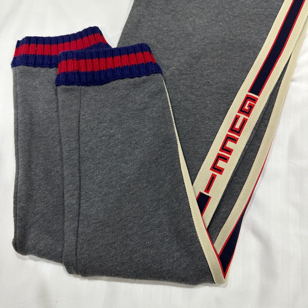 Gucci Logo Stripe Joggers (Category: Activewear) located in Quezon City. Submitted by ishdeclutters (Listing ID 1288364130, Image 2). Description: Condition: 9/10 Color: Grey with Blue-Red Stripes Size: XS-S Womens / Teens 12 Brand Style ID: 497950X9L52.