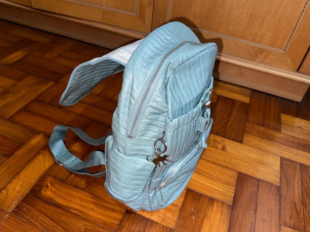 Kipling Backpack (Category: Backpacks) located in Singapore. Submitted by limmyyyyy (Listing ID 1288306328, Image 3). Description: Mint green, used only a few times. No defects, zippers working well. Bag height approx 34cm excluding the flap Original colours as shown in photos 4, 5 and 6. PICK UP IN MOUNTBATTEN or arrange own delivery.