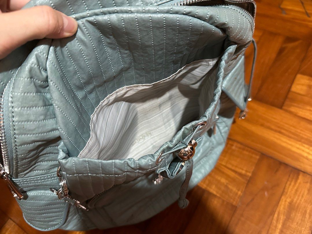 Kipling Backpack (Category: Backpacks) located in Singapore. Submitted by limmyyyyy (Listing ID 1288306328, Image 5). Description: Mint green, used only a few times. No defects, zippers working well. Bag height approx 34cm excluding the flap Original colours as shown in photos 4, 5 and 6. PICK UP IN MOUNTBATTEN or arrange own delivery.