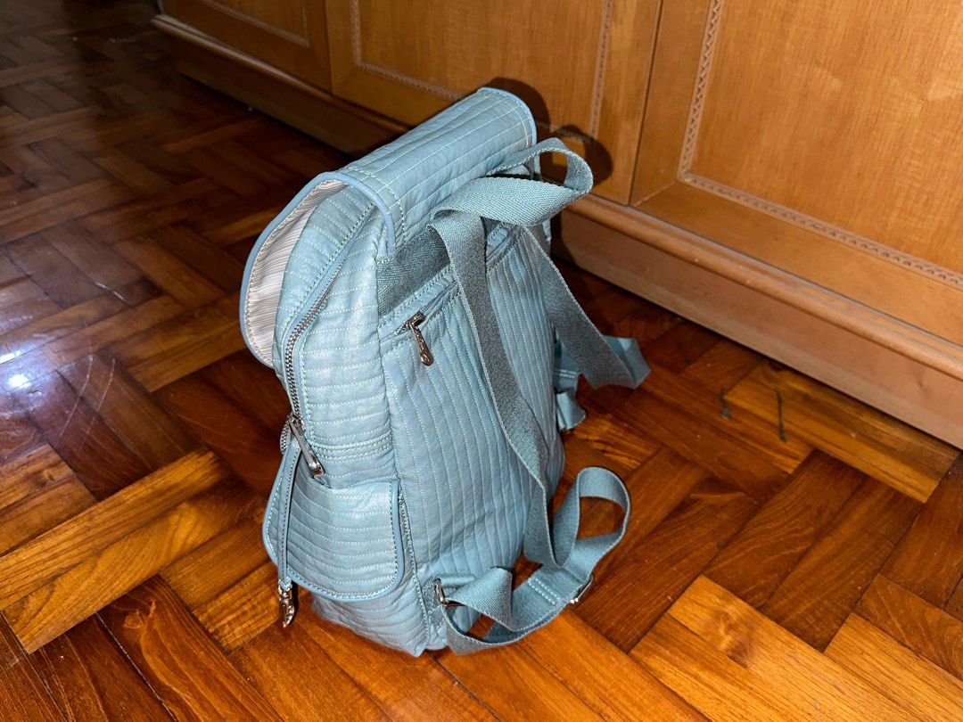 Kipling Backpack (Category: Backpacks) located in Singapore. Submitted by limmyyyyy (Listing ID 1288306328, Image 2). Description: Mint green, used only a few times. No defects, zippers working well. Bag height approx 34cm excluding the flap Original colours as shown in photos 4, 5 and 6. PICK UP IN MOUNTBATTEN or arrange own delivery.