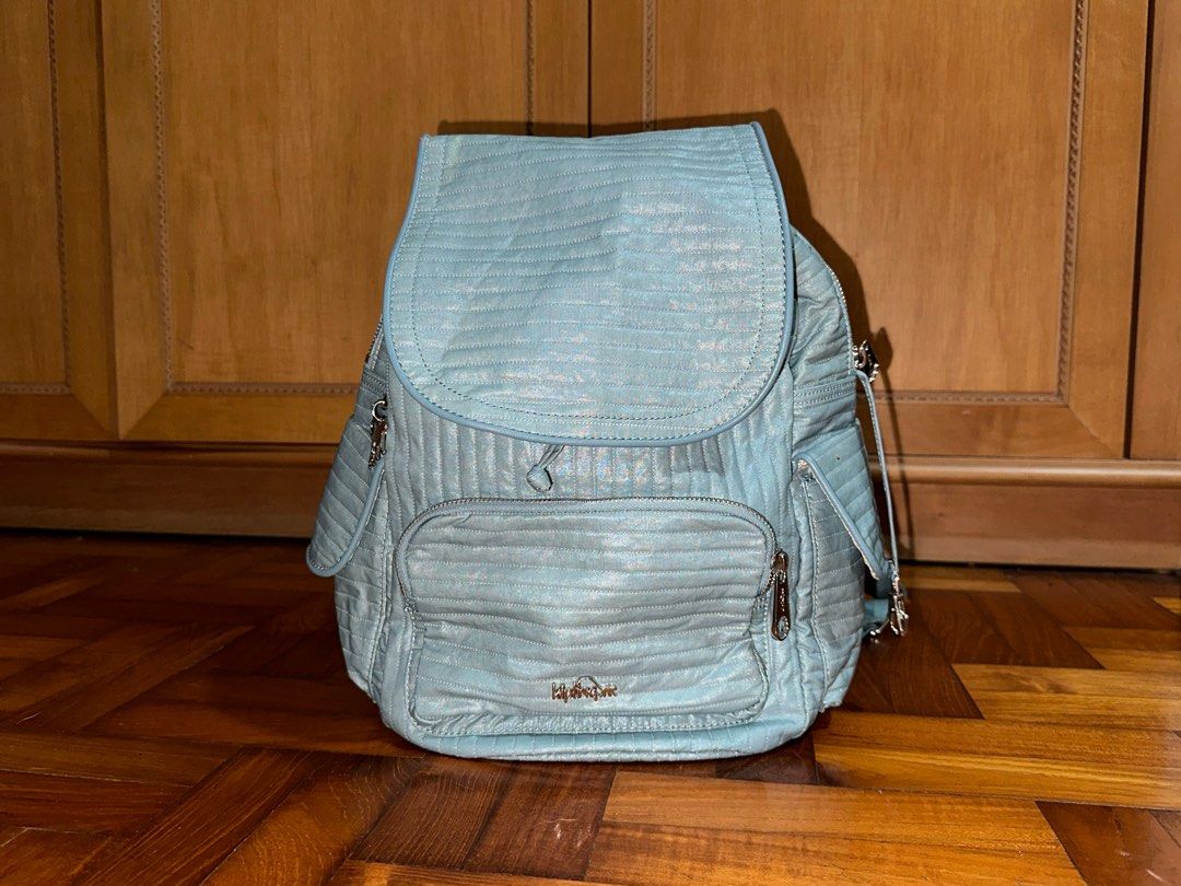 Kipling Backpack (Category: Backpacks) located in Singapore. Submitted by limmyyyyy (Listing ID 1288306328, Image 1). Description: Mint green, used only a few times. No defects, zippers working well. Bag height approx 34cm excluding the flap Original colours as shown in photos 4, 5 and 6. PICK UP IN MOUNTBATTEN or arrange own delivery.